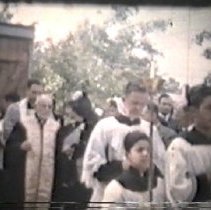 Still from outdoor religious parade circa 1960