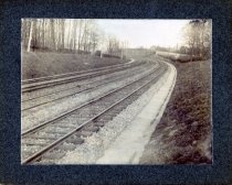 Three sets of tracks at curve.