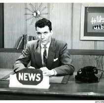 [Gary McLaren, news anchor]