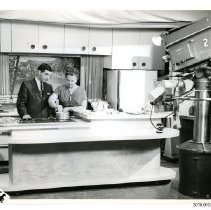 [Violet Scriver and Reg Sellner on set]