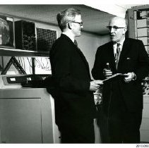 [W.D. McGregor and Carl Pollock in control booth]