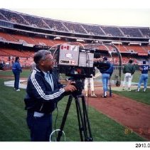 [John Arajs on baseball diamond]
