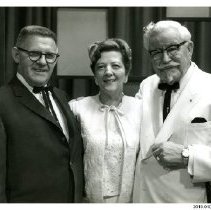 [Barney Strassburger Sr., Elaine Cole, and Colonel Sanders]