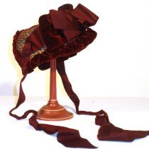 Vaillant Burgundy and Gold Bonnet