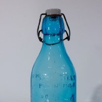 Blue Glass Milk Bottle - Front