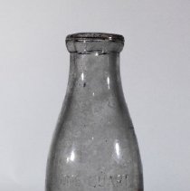 M. A. Smith glass milk bottle -  Front