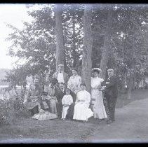 Group of People Next to Lake Waramaug