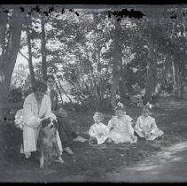 Group sitting together near a path
