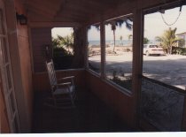 "Ding's front porch at 'Tween Waters cabin."