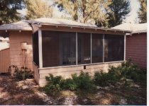 "Back of Ding's cabin at 'Tween Waters."