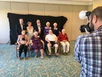 The luminaries with Rev. John Cedarleaf (standing, center)