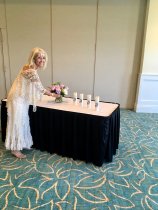 Susen Berg provides her personal flair to the flowers and commemorative ca