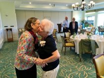 Janey Symington (L) greets Shirley Stanton