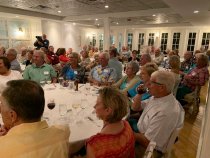 Theaudience seated in 'Tween Waters Inn's Old Captiva House dining room