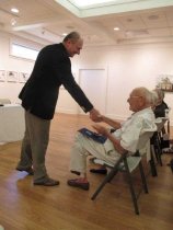 Ambassador Petr Gandalovic shakes hand of Karel Aster