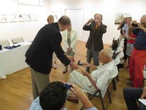 zech Ambassador Petr Gandalovic presents Aster with 1 of 3 awards