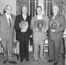 Floyd Owen (far right) received a plaque honoring 42 yrs of service (1955)