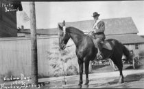 Man on horse, Labor Day 1909 in Harbor Springs