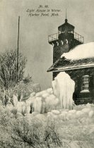 Light house in winter, Harbor Point, Postcard from Willis A Gibson, to Miss
