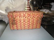 Natural wood color and red woven basket.