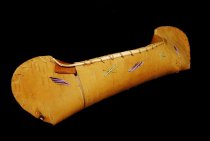 Canoe with purple and green quillwork.