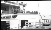 Three women on the deck of the steamship America