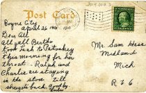 Back of a postcard of Railroad station in Boyne City Michigan