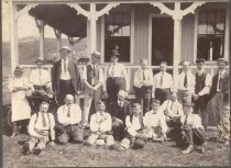 Men in Front of a Cottage