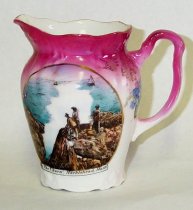 Cream pitcher wit "Churn"