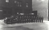 Ladder truck and crew in front of Central Station
