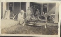 Volunteer and children in front of Farwell Ward
