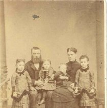 Unidentified family with 4 children presumed to be members of Cragg
