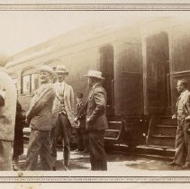 ph 24547 Hugh Templin (centre) & train ca.1920