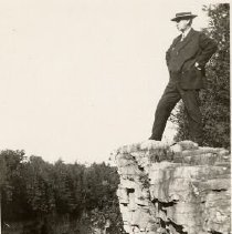 Unidentified man on cliff overlooking Elora Gorge, ca.1925.