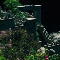 ph 18240_18 Looking over flower gardens to stone steps and archway, June 19