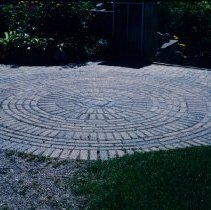 ph 18242_10 View of circular design in brick pathway.
