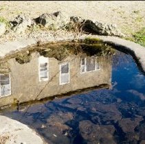 ph 18243_9 Reflection of stone building, 1994.