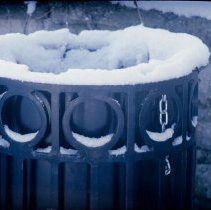 ph 18244_3 Garbage bin covered with snow, 7 Feb. 1995.