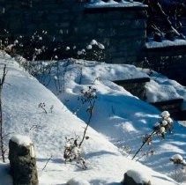 ph 18247_1 Snow on terraced, stone flower beds, February 2002.