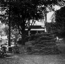Family in the backyard of the Short family home in Mount Forest, photograph, ca. 1925.
