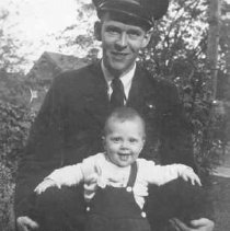Unidentified man and baby, Tait family ?, Fergus, ca. 1940