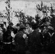 Meal time at barn raising, Harriston, Minto Township, 1901.
