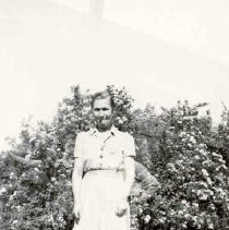 ph 21187 woman at shrubs