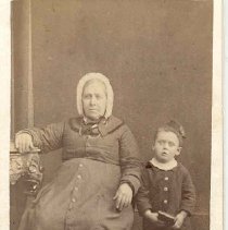 Elderly woman identified as Grandmother Watts, with Willie John Watts, ca.1
