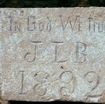 3387 Benham date stone