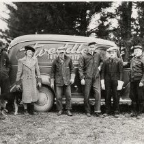 Employees and members of the Ransom family from West Garafraxa gathered around Tweddle Chick Hatcheries Ltd. truck, Fergus, ca. 1946.