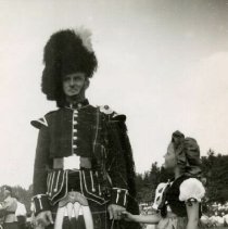 Drummer and dancer in highland costume, Fergus Highland Games ca. 1950