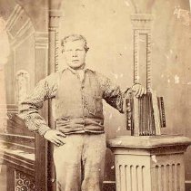 August Begerow of Puslinch Township, with concertina / accordian, ca. 1860.