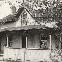 Exterior of 1-1/2 storey Ontario Gothic house located at 165 Melville Stree