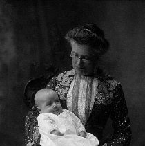 Portrait of Patrick Willet Brock (1902-1988) as a baby with his grandmother, photograph, 1903.